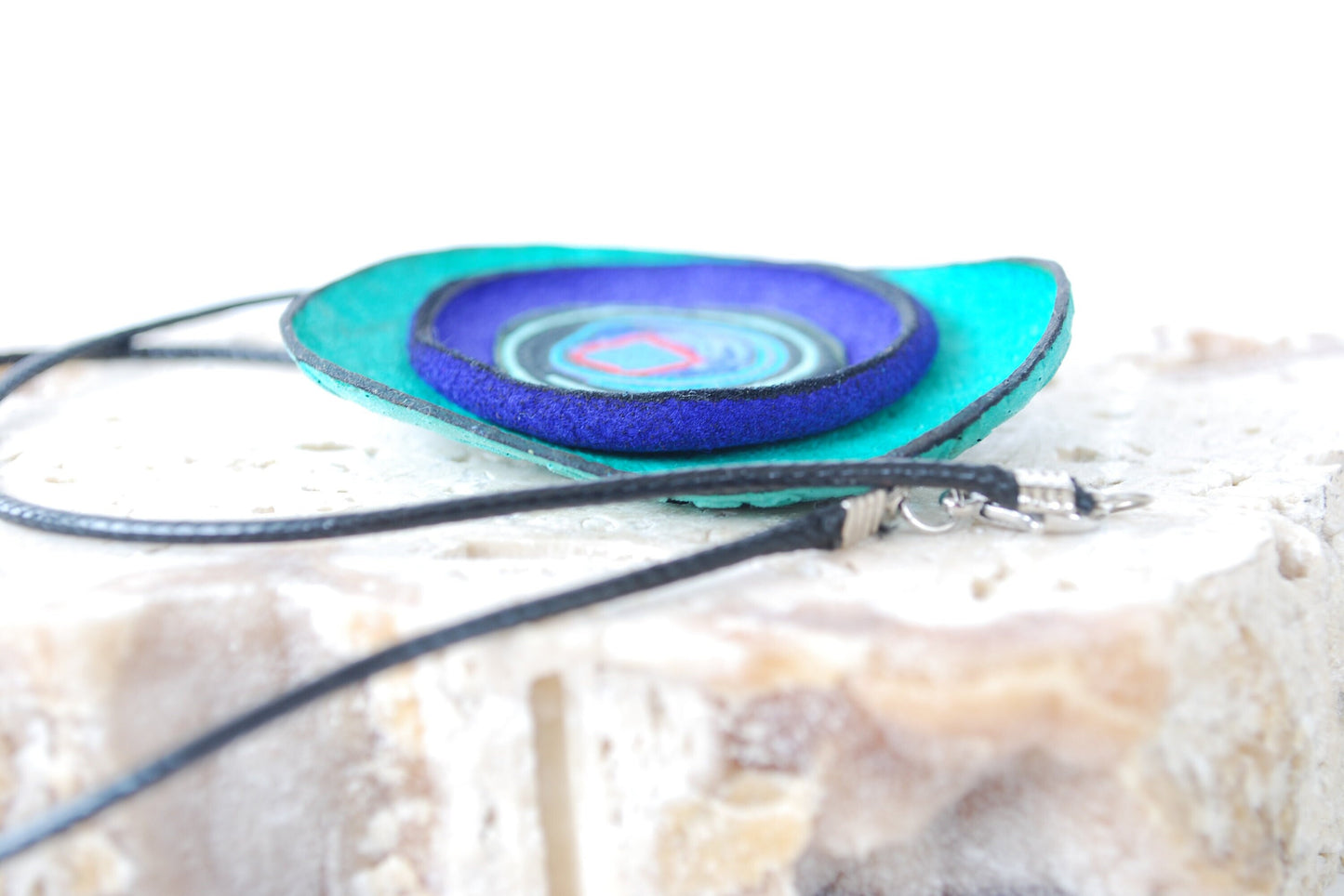 Turquoise & deep blue Leather Necklace with interesting lines and spirals